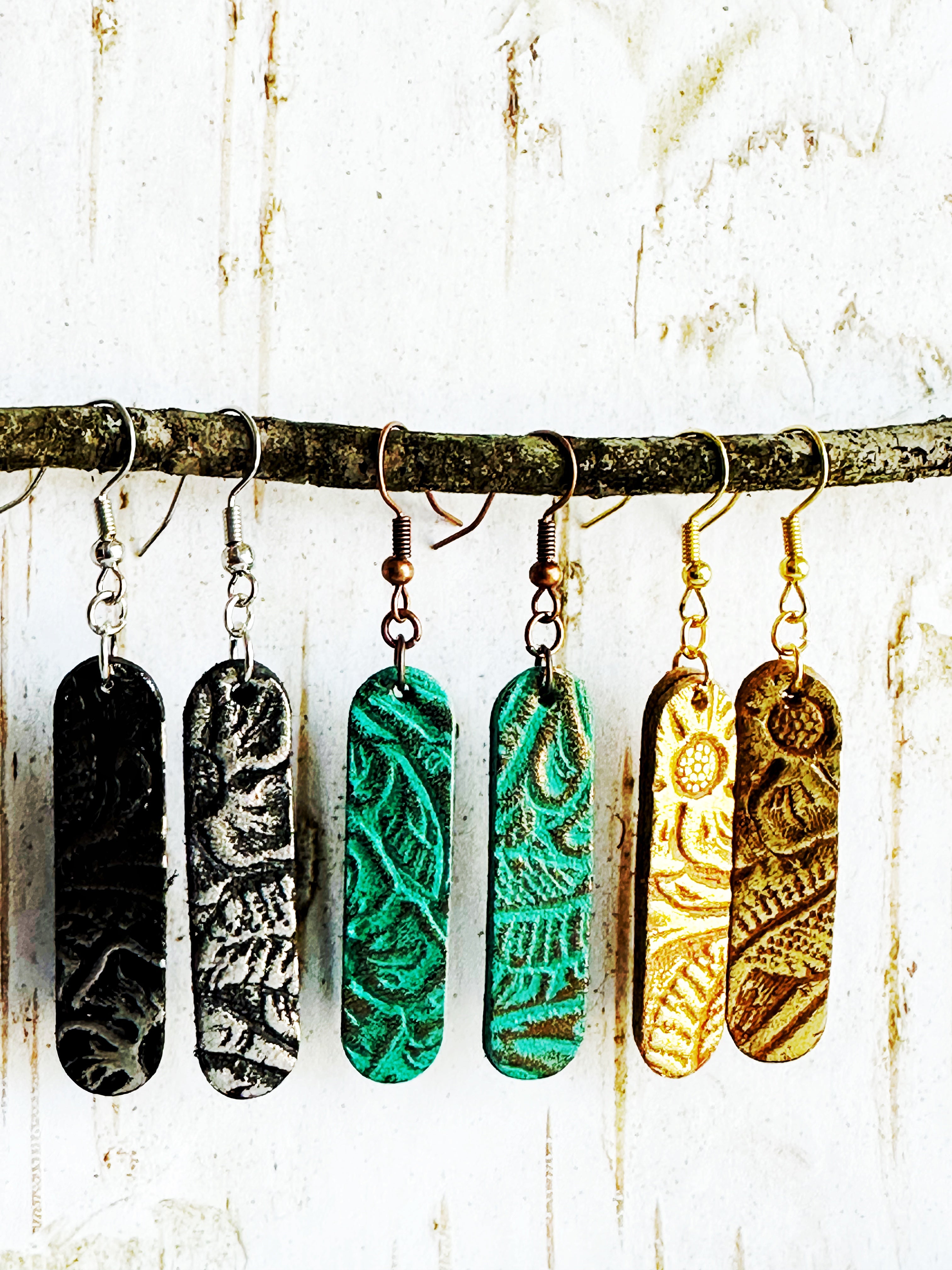 "Impressions" Embossed Leather Eliptical Earrings